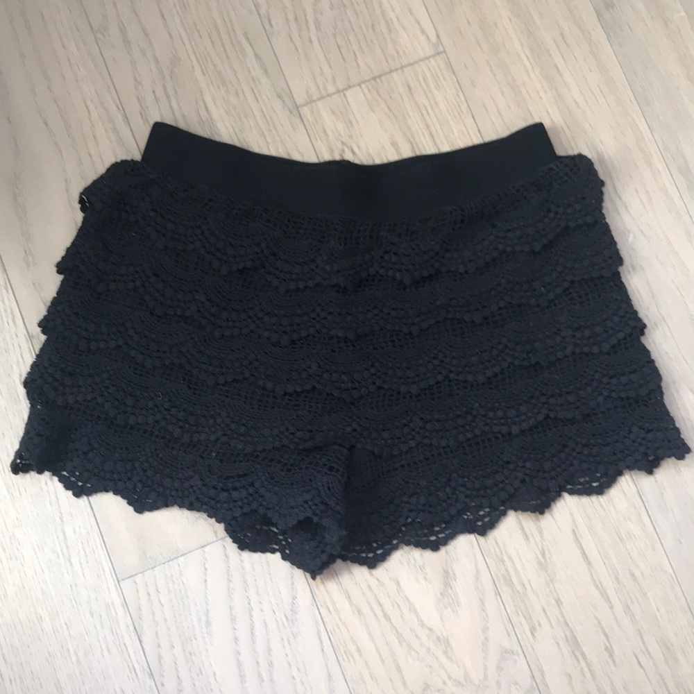 Aqua black crochet shorts.